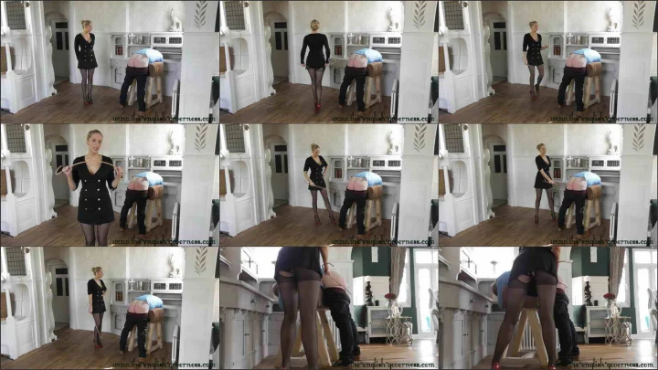 Screenshot 1 aus Governess Kenworthy Canes his Bare Bottom Femdom Spanking Video