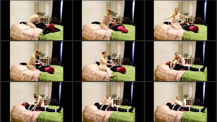 Screenshot 1 aus Tried so Hard, Nylondoll Meets Dina: Hogtied and Foot Teased. bondishboys com