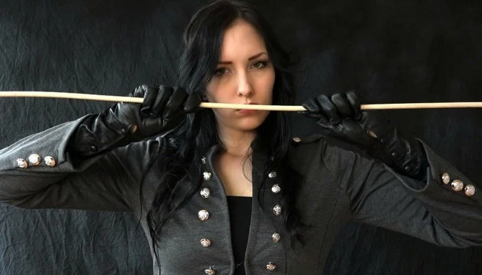 Nemesis – German FemDom Mistress, The Cruel Caning Mistress