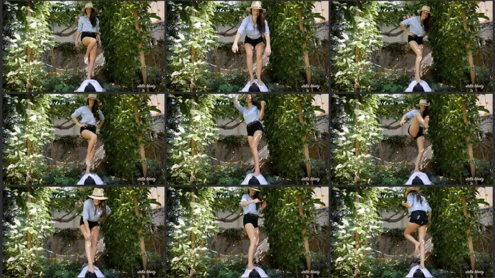 Screenshot 1 aus Outdoors Foot Domination, Trampling Garden Pests – Stella Liberty Femdom Video