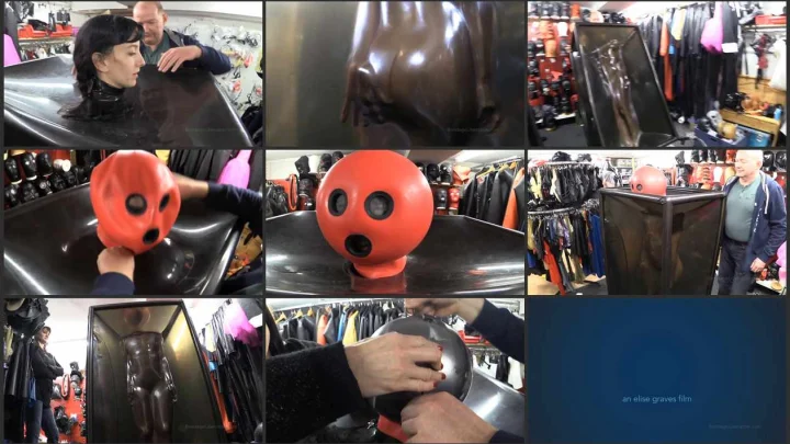 Screenshot 1 aus Rubber Fetish, Studio Gum: Elise’s First Vac Cube with Elise GravesMistress Miranda, and Petgirl Kako