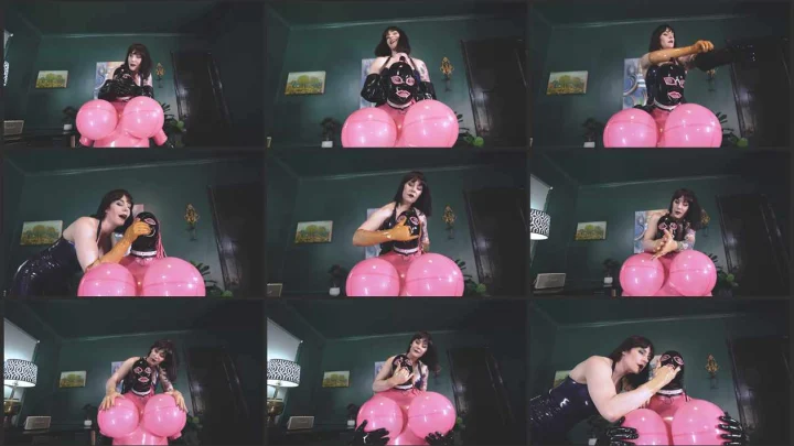 Screenshot 1 aus Hand Over Mouth and Glove Fetish, Magical Gloves at the Rubberdoll Factory with Mistress Andrea Untamed