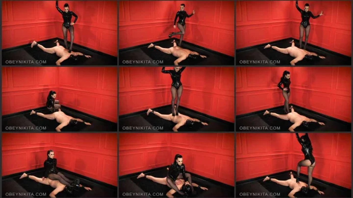 Screenshot 1 aus Trampling, Human Rug Gets Stepped with Mistress Nikita
