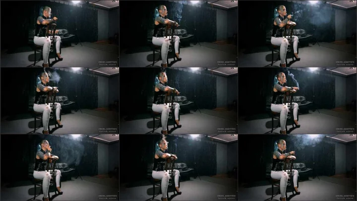 Screenshot 1 aus Fetish Art, Smoking On a Chair in High Heels with Mistress Anette