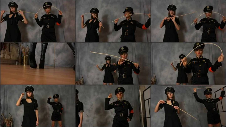 Screenshot 1 aus Double FemDom POV in Uniform, We Will Cane You Black and Blue with Lady Olga and Lady Kat