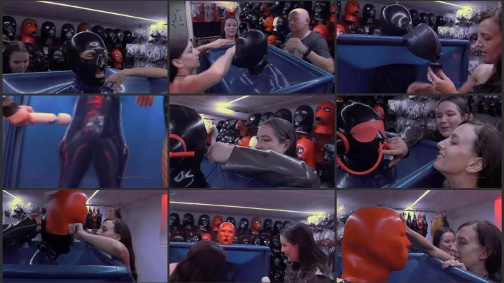 Screenshot 1 aus Rubber Fetish & Bondage Device, Hood Slut with AliceinBondageland and Elise Graves