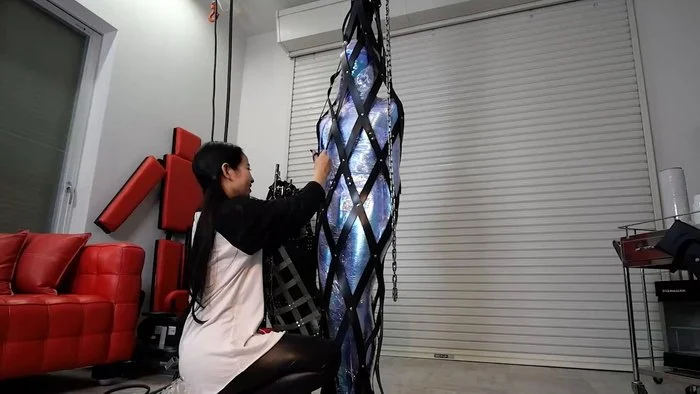 Shiny Suit Mummification and Leather Bag Suspension