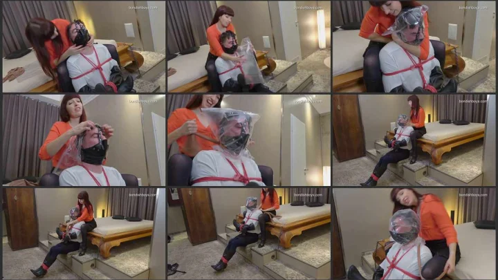 Screenshot 1 aus Terrible fate bound slave in a tight gag and a bag on his head