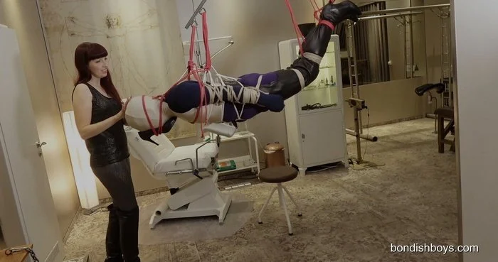 Renee pull the ropes extra tight in suspension bondage