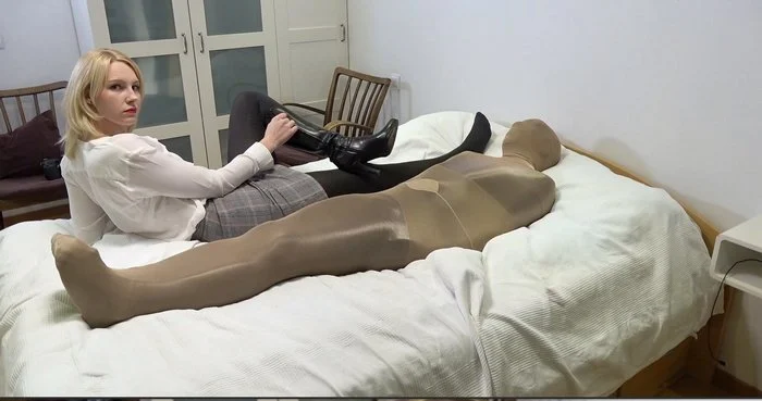 Mummify slave in nylon and force smelly feet to sniff